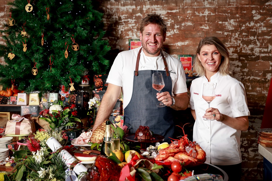 Coles Ambassadors Curtis Stone and Courtney Roulston pose during the Coles Christmas 2022 Media Launch at La Botanique